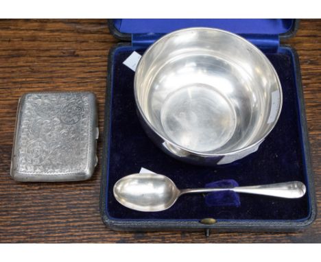 A cased silver presentation bowl and spoon hallmarked Birmingham 1907 and Sheffield 1942, and a silver pocket cigarette case 