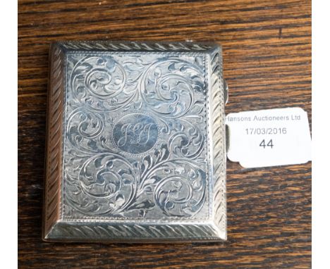 An early 20th Century silver cigarette case, with a scrolled front and back, gilt interior, hallmarked for Frederick Field Bi