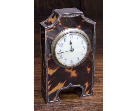 A silver mounted tortoiseshell mantle clock, having Arabic numerals, with key (crack to face) maker's mark HCD Birmingham 190