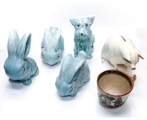 A collection of ceramic animals to include four Sylvac style animals and a novelty money box in the form of a pig 