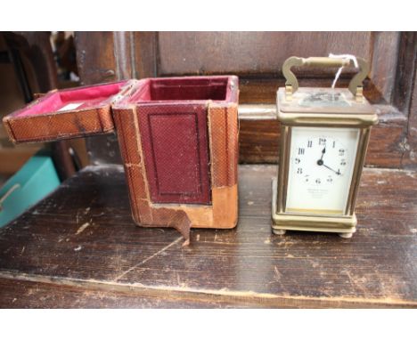 A Goldsmiths Company French made carriage clock in box with key (af) 
