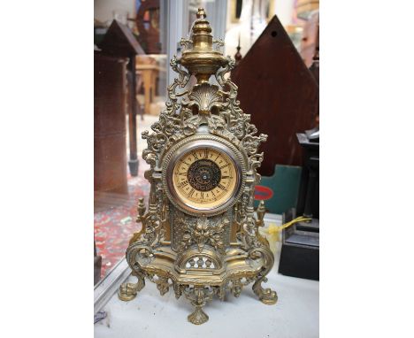 A late 19th Century brass cased mantle clock, fitted with a replaced movement, quartz operated 