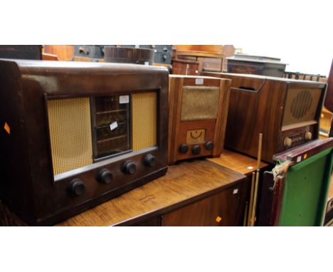 A circa 1950s wooden radio, a Bush radio with an Ekco radio/record player (3) 