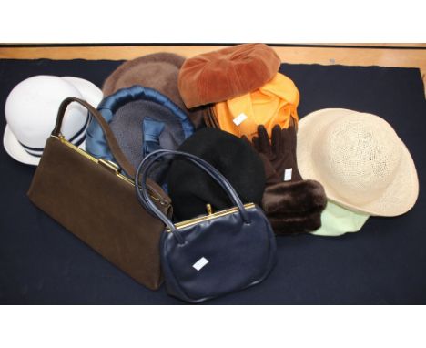 A collection of hats to include, a white Kangol straw hat with navy trim, a burnt orange Bermona edged in brown, straw late 1
