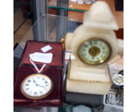 A cased Brevetts travelling clock, the dial with Roman numerals, together with a small marble mantle clock, enamelled dial an