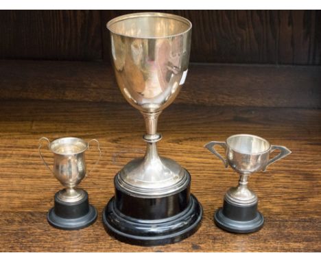 Three 20th Century silver trophy cups, each with detachable base, all with Birmingham hallmarks, various dates and makers, he