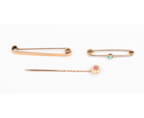 A yellow metal ruby and seed pearl bar brooch, a yellow metal turquoise set brooch, together with a 9ct gold bar brooch, (3)