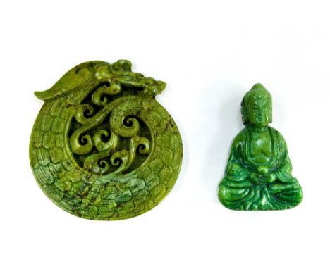 A jade seated deity with a jade dragon 