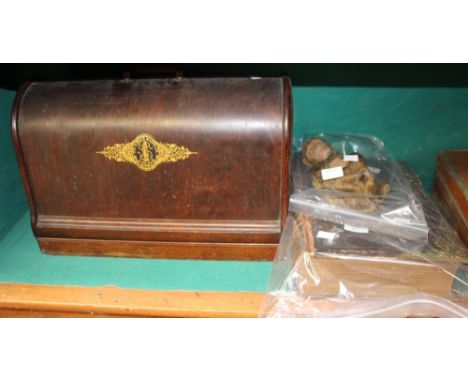 Singer sewing machine, Bible and an early mohair hand puppet 