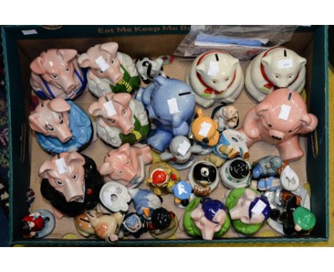One box of Wade collectable Natwest money box pigs, teddy bears money boxes, cruets, Andy Cap 1990s, Sooty and Sweep with cer