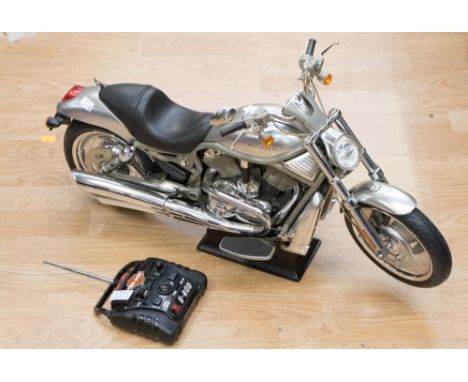 A New Bright U-ROD radio controlled battery operated Harley Davidson motor bike and hand set 