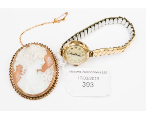  A ladies' 9ct vintage 9ct gold Bernex wristwatch on an expanding plated bracelet together with a shell cameo brooch set in a
