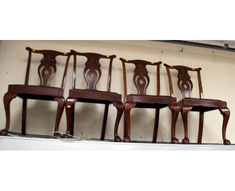 A set of six early 20th century mahogany dining chairs, in the manner of Thomas Chippendale, with shaped and pierced back spl