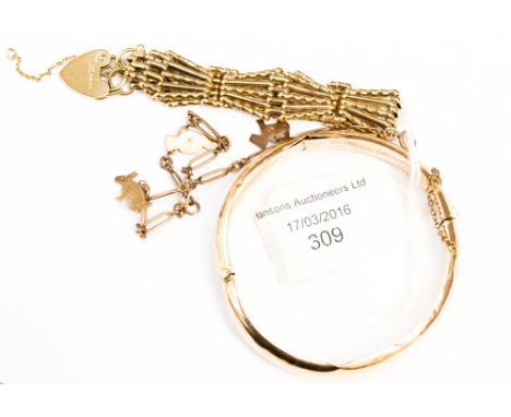 A rose metal link bracelet with three 9ct gold Edwardian 1920s charms (3.5 grams approx.) together with a 9ct gold .375 gate 