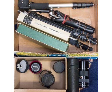A collection of vintage camera lenses, tripods and photo Technik magazines, lenses to including a Tokina RMC 17 mm, Nikkor P 
