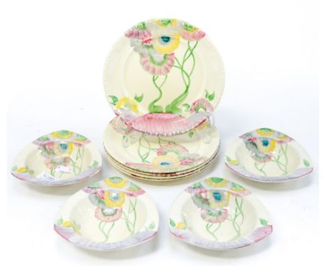 A part service of Clarice Cliff comprising five plates and four bowls