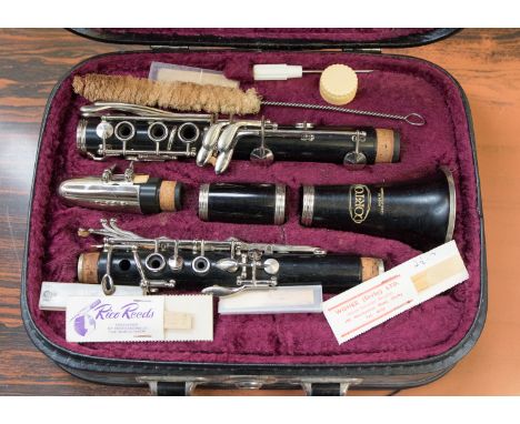 A cased Corton Clarinet, nickel fittings, with accessories 
