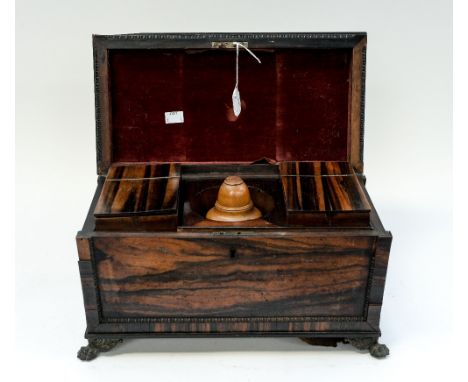 A mid 19th Century tea caddy on four lion paw feet (af)