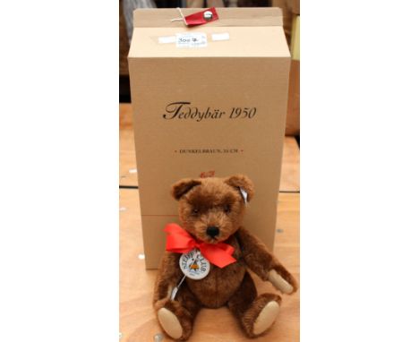 A boxed Steiff limited edition Steiff club edition replica 1950 teddy bear, dark brown mohair, squeaker no. 2066 model no 420