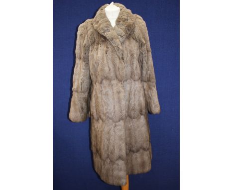 One light brown rabbit fur coat 