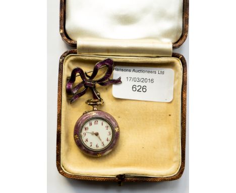 An enamelled engine turned ladies brooch watch, having a silver bow pin fastener, and a gold on silver watch, circa 1912, pos