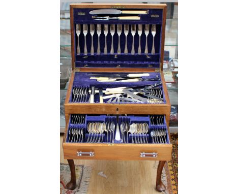  An Edward VIII twelve place canteen of cutlery, to include twelve silver main course forks, eleven silver entree forks, twel