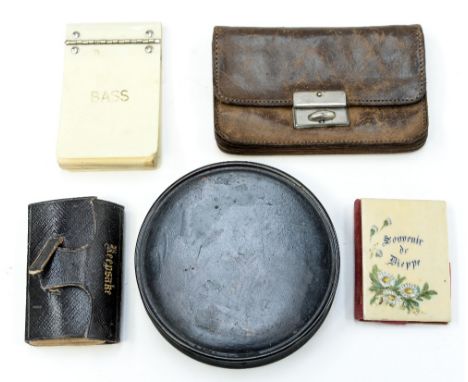 A Georgian circular snuff box, together with an ivorine note book, and a keepsake pin cushion and a leather purse and ivorine