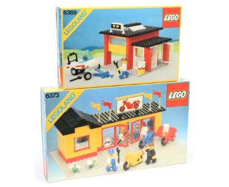 Lego pair of vintage Legoland sets (1) 6373 Motorcycle Shop (2) 6369 Lego Town Garage, both with instructions Not checked for