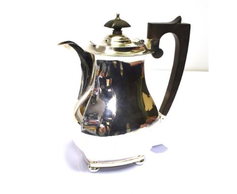 ART DECO SILVER COFFEE POT  Standing 22.0cm tall, of geometric form with classical handle on orb feet.  Hallmarked Birmingham