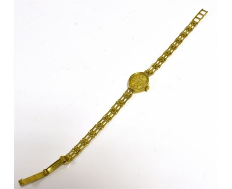 9CT GOLD LADIES BULOVA WRISTWATCH  Oval gold case and bright cut, gate link bracelet, stamped 0.375 and hallmarked Birmingham