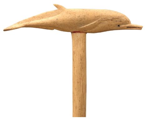 A 19TH CENTURY MARINE IVORY WALKING STICK, the handle primitively carved as a dolphin, the haft with metal ferrule, 85.5cm lo