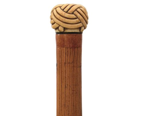 A GEORGIAN SWORD STICK OF LARGE PROPORTIONS, with ivory Turk's head pommel, wooden haft pierced for a thong, 64cm blued and g