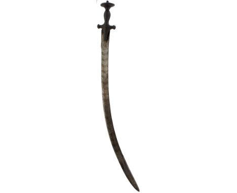 AN 18TH/19TH CENTURY INDIAN TULWAR WITH PATTERN WELDED BLADE, 74cm sharply curved clipped back blade, possibly of watered ste