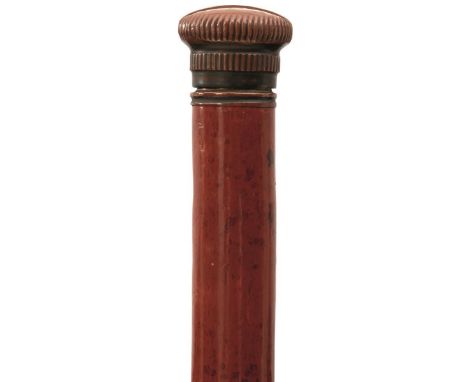 A LATE 19TH CENTURY TOPER'S CANE, the reeded copper pommel unscrewing to reveal a glass whisky or spirits flask with cork sto