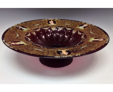 A Bohemian ruby glass pedestal centre bowl, fluted dish, the deep sides with six oval cartouches, 42.5cm diam, mid 20th centu