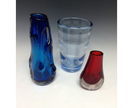 A Whitefriars Kingfisher knobbly vase; a tapering pale blue banded vase; another, ruby (3)