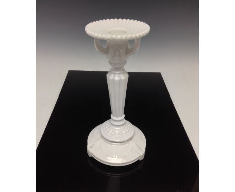 A Sowerby white pressed glass candlestick, circular base, fluted column, 22.5cm high, c.1880s