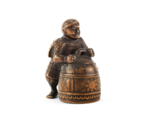 A Wood netsuke of Benkei and the bell of MiideraEdo period (1615-1868), early 19th centuryThe warrior monk shown leaning forw