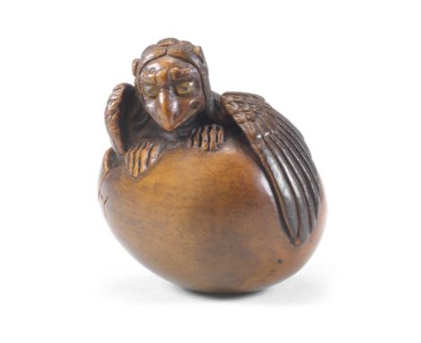 A wood netsuke of a tengu no tamago (hatching tengu)By Toyoyasu (Toyoyo, 1811-1883), Sasayama, Tanba Province, Edo period (16