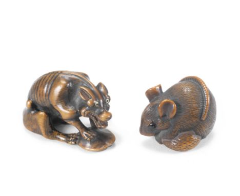 Two boxwood netsukeOne by Masatomo, Edo period (1615-1868), mid-19th centuryThe first a rat seated and bending over a large c