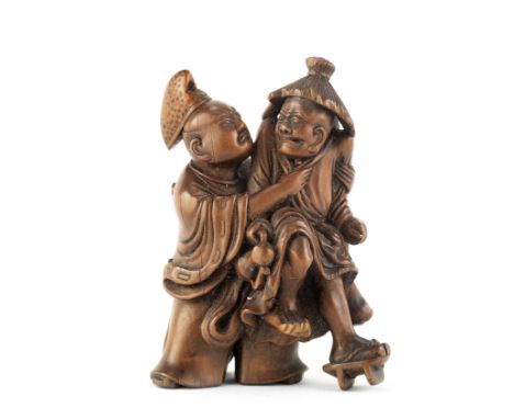 A wood group netsuke of Taira no Tadamori apprehending the oil thiefEdo period (1615-1868), late 18th/early 19th centuryThe f