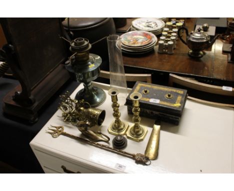 A pair of brass candlesticks; a cash tin; toasting fork; oil lamp etc. 
