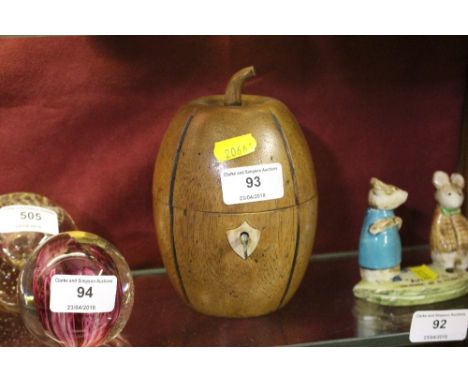 A novelty wooden tea caddy in the form of a melon