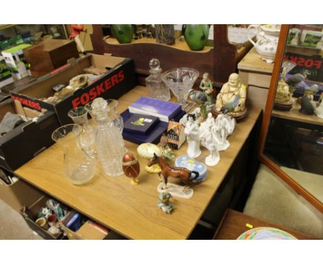 A quantity of decorative ornaments; a boxed Royal Worcester cake plate; glass decanters; vases etc. 