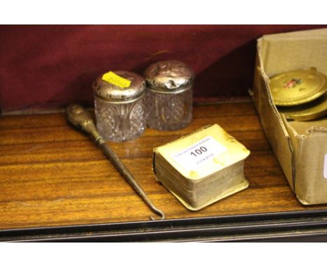 A miniature ivorine covered Common Prayer book AF; together with two small silver topped jars; and a button hook