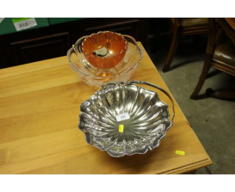 A silver plated swing handled basket; a Carnival glass pedestal bowl; one other glass bowl; and a musical table lighter 