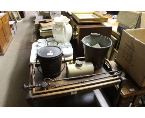 A metal swing handled bucket; together with a stoneware hot water bottle; a pair of 19th Century fire tongs; a brass table la