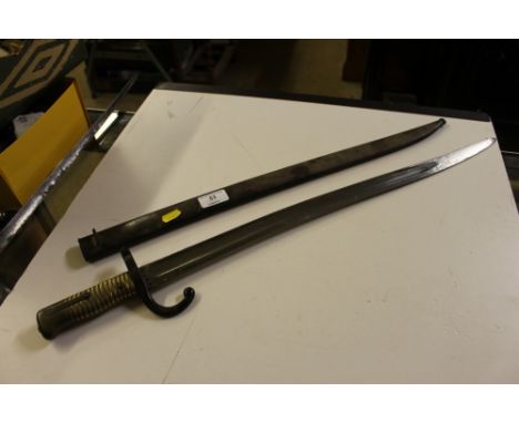 A French bayonet with scabbard dated 1872