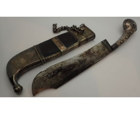 Antique eastern knife and scabbard with possibly unmarked silver hilt and decoration blade is 25 cm long 