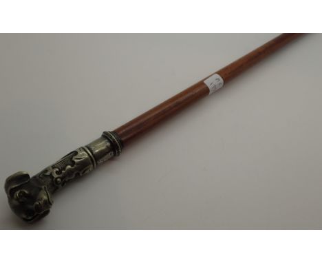 Small swagger stick with head of a pointer or hunting dog to top 